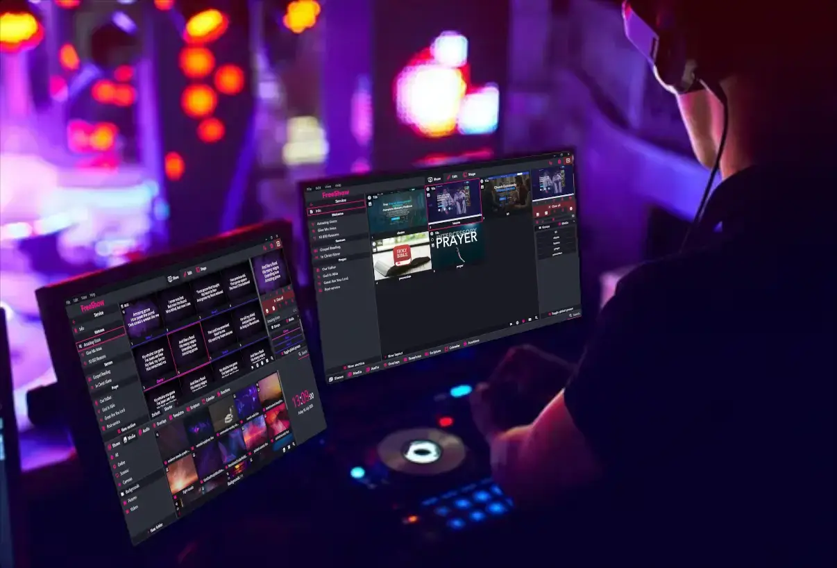 Person using FreeShow at computer